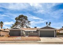 Charming single-story home features a xeriscaped front yard and a two-car garage at 3991 Shadow Wood Ave, Las Vegas, NV 89121