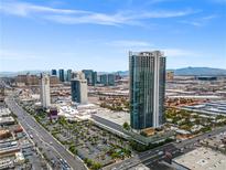 Las Vegas condo with Strip views, modern high-rise architecture, ample parking, and a vibrant cityscape at 4381 W Flamingo Rd # 1907, Las Vegas, NV 89103