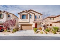 Charming two-story home with a well-manicured front yard and an attached two-car garage at 7664 Mallard Bay Ave, Las Vegas, NV 89179