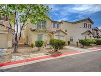 Charming two-story home with a tidy front yard, inviting curb appeal, and attached garage at 4224 Glisan Ct, Las Vegas, NV 89129