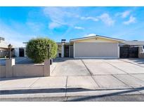 Charming single-story home featuring a spacious driveway and a well-maintained front yard at 4363 Del Santos Dr, Las Vegas, NV 89121