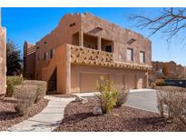 Stunning multi-level home with a three-car garage and unique Southwest-style architectural details at 730 Hardy Way # A, Mesquite, NV 89027