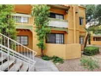 Charming condo with a well-maintained exterior and inviting landscaping at 5130 S Jones Blvd # 108, Las Vegas, NV 89118
