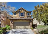 Charming two-story home with a stone-accented front and attached two car garage at 6457 Lovett Canyon St, Las Vegas, NV 89148