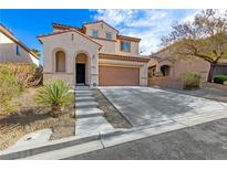 Charming two-story home with a welcoming front entrance and a two-car garage at 2664 Strichen Ave, Henderson, NV 89044