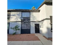 Charming condo featuring stucco siding, dual pane windows, and a well-maintained front yard at 3420 Mercury St # H, North Las Vegas, NV 89030