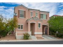 Charming two-story home with a cozy front porch and attached garage, offering a blend of comfort and convenience at 6234 Pangea Ave, Las Vegas, NV 89139