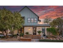 Charming two-story home with stone accents and professionally landscaped front yard at 3069 Lascari Ave, Henderson, NV 89044