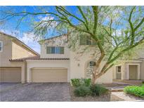Charming two-story home with a two car garage and mature landscaping at 5832 Sleepy Willow St, Las Vegas, NV 89148