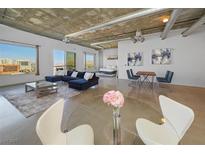 Bright and airy living room featuring modern decor, large windows, and an open floor plan at 900 Las Vegas Blvd # 903, Las Vegas, NV 89101