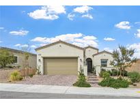 Charming single-story home featuring desert landscaping and a two-car garage at 10196 Millholm Ave, Las Vegas, NV 89166