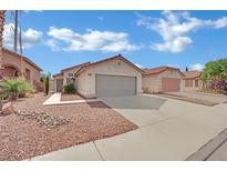 Charming single-story home with stucco exterior, well-maintained landscaping and a spacious driveway at 3773 Bossa Nova Dr, Las Vegas, NV 89129