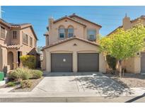 Charming two-story home featuring a two-car garage and desert landscaping at 7826 Shingle Beach St, Las Vegas, NV 89166