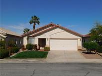 Charming single-story home with a well-maintained front yard and a two-car garage at 192 Oella Ridge Ct, Henderson, NV 89012