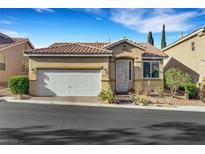 Charming single-story home with a two-car garage and desert landscaping at 10364 Bent Willow Ave, Las Vegas, NV 89129