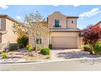 Charming two-story home featuring a neutral color palette, low maintenance landscaping, and a two-car garage at 12245 Olivetta Ct, Las Vegas, NV 89138