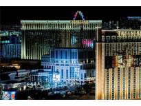 Las Vegas Strip hotels: Venetian, Palazzo, and Treasure Island, at night at 2000 N Fashion Show Dr # 4301, Las Vegas, NV 89109
