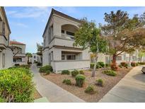 Well-maintained condo with desert landscaping, a walkway and ample outdoor space at 3125 N Buffalo Dr # 1091, Las Vegas, NV 89128