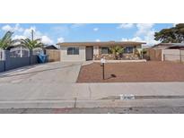 Charming single-story home features a tidy front yard and desert landscaping for low maintenance at 4562 Scott Ave, Las Vegas, NV 89102
