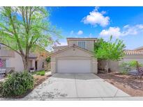 Charming two-story home featuring a two-car garage and well-maintained landscaping in a residential neighborhood at 6217 Lone Cypress Ct, Las Vegas, NV 89141