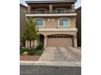Charming two-story home features a second-floor balcony and a spacious two-car garage at 6516 Austin Hope Ave, Las Vegas, NV 89118