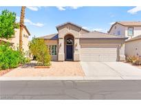 Charming single-story home featuring desert landscaping and a welcoming entrance at 5752 Shermer Ct, Las Vegas, NV 89120