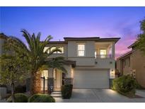 Charming two-story home with a well-manicured lawn and a desert-friendly landscape at 10505 Howling Coyote Ave, Las Vegas, NV 89135