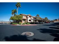 Inviting condo community with well-maintained landscaping and convenient covered parking at 231 W Horizon Ridge Pkwy # 314, Henderson, NV 89012