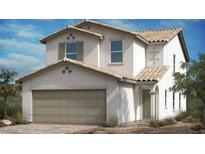 Beautiful two-story home featuring neutral color palette, tile roof, two-car garage and low maintenance desert landscaping at 4282 Yucca Brevi Ave, Las Vegas, NV 89139
