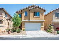 Charming two-story home featuring a two-car garage and low maintenance desert landscaping at 6476 Ness Gardens Ct, Las Vegas, NV 89122