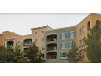 Multi-story apartment building featuring patios and balconies at 30 Strada Di Villaggio # 631, Henderson, NV 89011