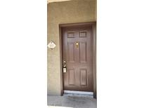 Entry door featuring a secure electronic lock system on a well-maintained complex with unit number 1015 at 9000 Las Vegas Blvd # 1015, Las Vegas, NV 89123