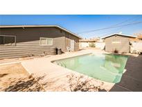 Backyard view showcasing a refreshing in-ground pool and patio area perfect for entertaining at 2540 Eagle St, Las Vegas, NV 89142