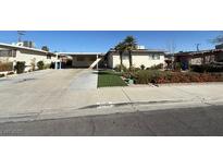 Single story home with desert landscaping and attached carport at 6248 Dayton Ave, Las Vegas, NV 89107