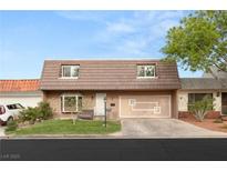Charming home with a well-maintained lawn and unique exterior design, adding to its curb appeal at 3774 Decade St, Las Vegas, NV 89121