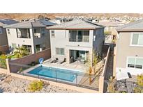 Inviting backyard features a refreshing private pool, perfect for relaxation and outdoor enjoyment at 41 Strada Moscato, Henderson, NV 89011