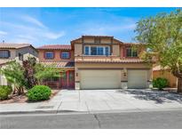 Inviting two-story home featuring a well-manicured front yard and a spacious two-car garage at 4216 Thunder Twice St, Las Vegas, NV 89129
