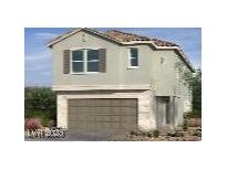 Charming two-story home featuring a stucco exterior, tiled roof, and an attached one car garage at 9076 Rivington Ave, Las Vegas, NV 89148