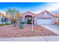 Charming single-story home featuring desert landscaping and a two-car garage at 1309 Misty View Ct, North Las Vegas, NV 89031