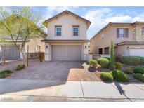 Charming two-story home with a two-car garage and well-manicured front yard at 301 Andantino Pl, Henderson, NV 89015