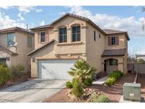 Charming two-story home with a well-maintained yard and a two-car garage at 4804 Portola Vista Ave, Las Vegas, NV 89139