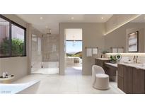 Modern bathroom featuring a soaking tub, walk-in shower, dual vanity and light tile flooring at 6 Harlow View Ct # 18, Henderson, NV 89012