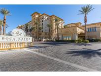 Beautiful condominium complex, Boca Raton, with attractive landscaping and elegant entrance at 2405 W Serene Ave # 236, Las Vegas, NV 89123