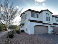 Beautiful two-story home featuring a two-car garage and well-maintained landscaping at 727 Pickled Pepper Pl, Henderson, NV 89011