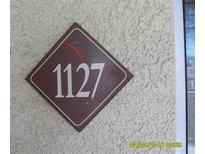 Close up of building number 1127 against an exterior wall at 7885 W Flamingo Rd # 1127, Las Vegas, NV 89147