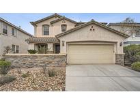 Charming two-story home featuring desert landscaping and a spacious two car garage at 10808 Wallflower Ave, Las Vegas, NV 89135
