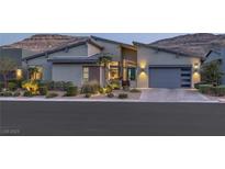 Charming single-story home with a modern design, well-maintained landscaping, and a convenient two-car garage at 10271 Meridian Hill Ave, Las Vegas, NV 89135