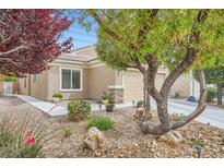 Charming single-story home with desert landscaping, mature trees and great curb appeal at 2324 Willow Wren Dr, North Las Vegas, NV 89084