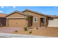 Charming single-story home showcasing a neutral palette, two-car garage, and low maintenance desert landscaping at 2728 Pavehawk Way, Las Vegas, NV 89156