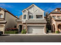 Charming two-story home boasts stone accents and a well-manicured front yard at 9173 Whitekirk Pl, Las Vegas, NV 89145